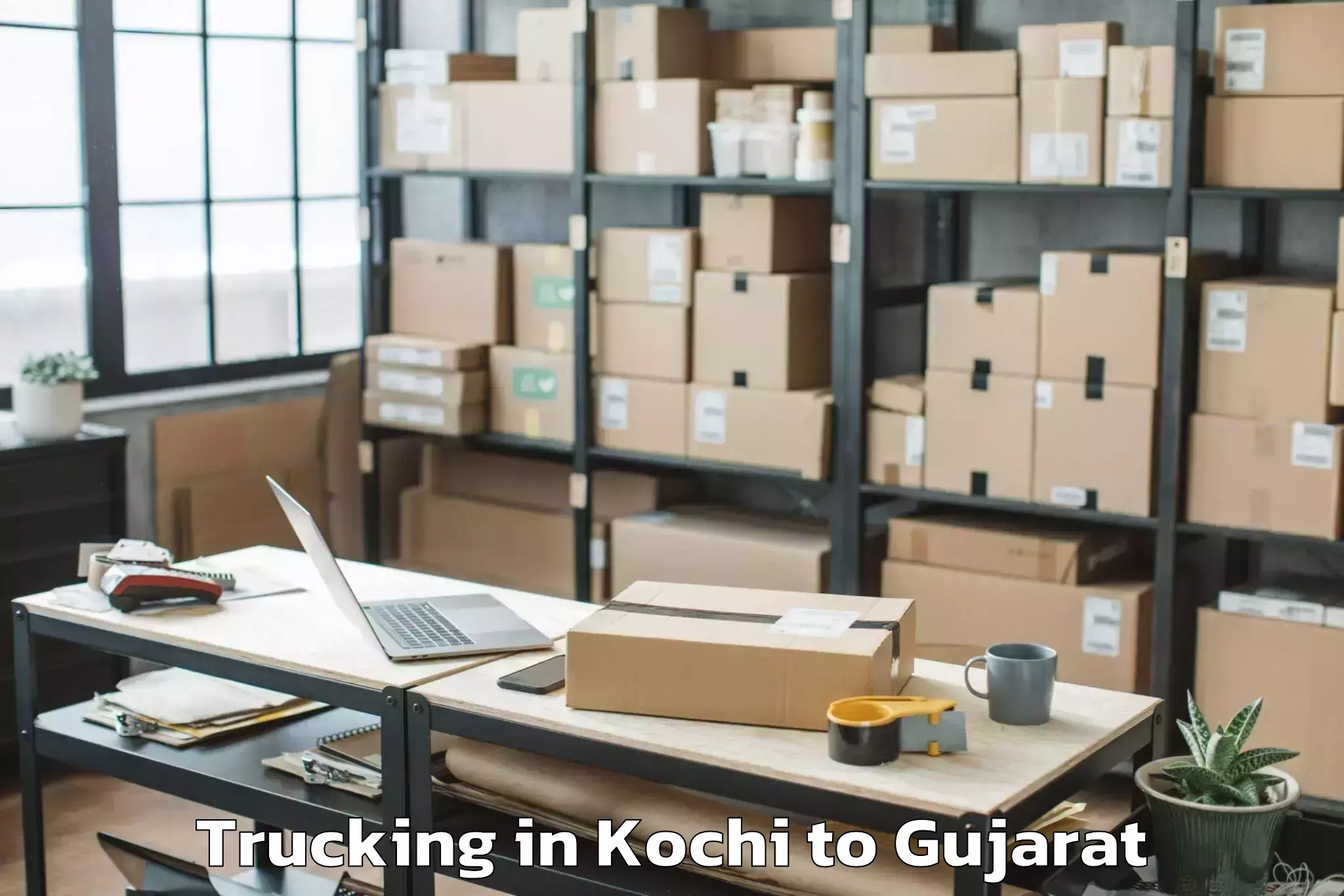 Easy Kochi to Malpur Trucking Booking